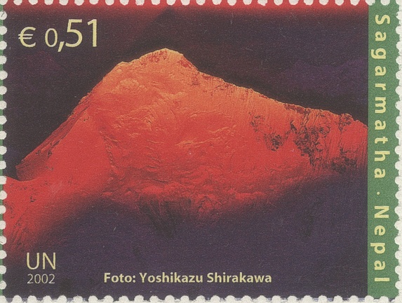 Item no. S384d (stamp)
Type: stamp
Country: United Nations (Vienna)
Date of issue: 24 May 2002
Catalog number: Scott 317 (of 314 – 317)
Stamp (4) of a 4-stamp set issued to commemorate “International Year of the Mountain”. It shows reproduction of a photograph by Japanese landscape photographer YOSHIKAZU SHIRAKAWA (b. 1935) “Sagarmatha” (Sagarmatha is one of fourteen zones in Eastern Nepal. It includes mountain districts of the Himalayas, including Mount Everest).
Item no. S384d (stamp).jpg