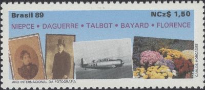 Item no. S176 (stamp)
Type: stamp
Country: Brazil
Date of issue: 14 August 1989
Catalog number: Scott 2203
Stamp issued to commemorate 150th Anniversary of Photography (Ano Internacional da Fotografia) and to honor inventors of photography (Niépce, Daguerre, Talbot, Bayard and Florence) – their names are specified on the stamp.
Item_no._s176__stamp_.jpg