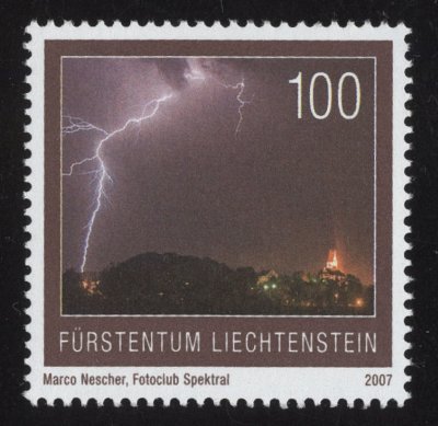 Item no. S227 (stamp)
Type: stamp
Country: Furstentum Liechtenstein
Date of issue: 19 November 2007
Catalog number: Scott1398
Stamp (of 3-stamp set) “Natural Phenomena” showing lightning over Bendern. The stamp’s design is based upon photograph by MARCO NESCHER, photographer of Fotoclub Spektral.
Item_no._s227__stamp_.jpg